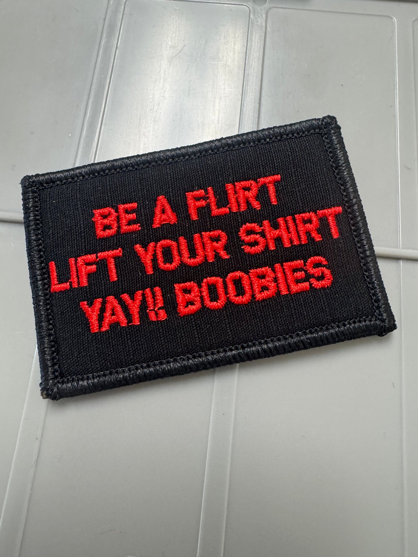 As Seen on Socials - Be A Flirt Lift Your Shirt Yay!! Boobies - 2x3 Patch - Black w/Red