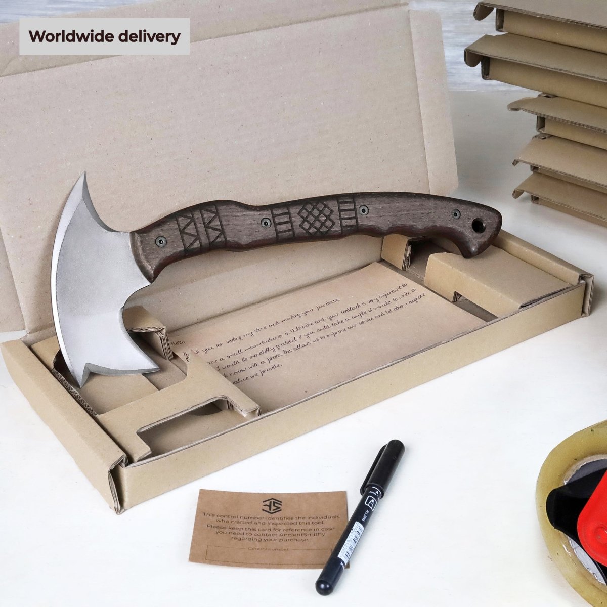 Handcrafted tomahawk "Takoda" with tribal engraving